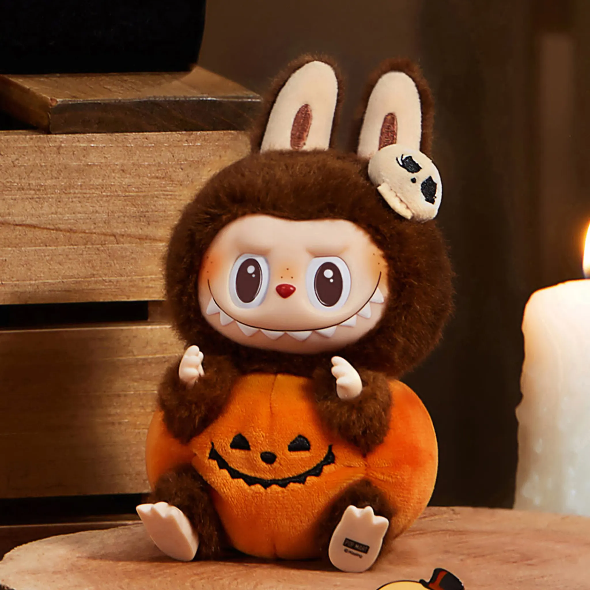 Front Side View of Pop Mart Labubu Happy Halloween Party Series-Sitting Pumpkin Vinyl Plush Pendant (Single)
